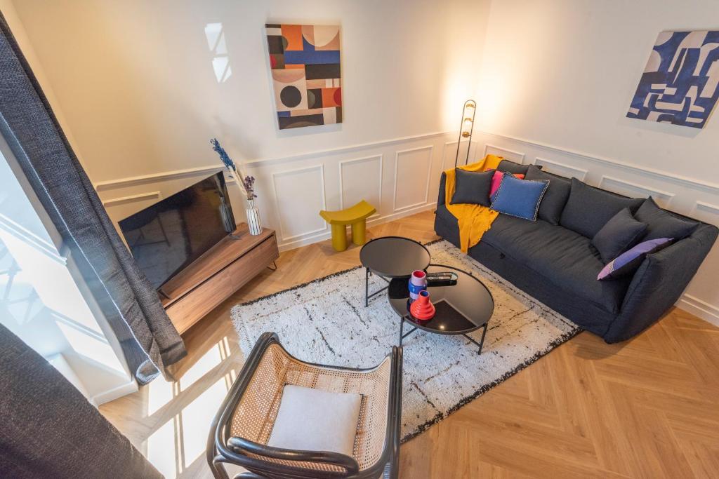 Le Cosy Chic . Proche gare . Centre-ville Mâcon . Neuf . Climatisation . Design . Wifi .